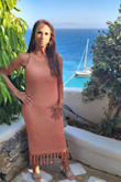 Love this dress! Bought it for a vacation in Greece. Bought in medium.
Fit true to size. Beautiful melon color looks great with a tan. Got lots of compliments. - Jodi N.