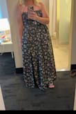 I went with a 1XL because they did not have an XL in stock, and I loved the dress, so I decided to get it altered! It was definitely too long (I'm 5'3"); it was also flattering for someone who just had a baby 5 months ago! Would definitely recommend this dress! - Megan D.
