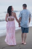 The colors and fabric of this dress are beautiful. I agree with other reviews. The dress itself is heavy, which makes it tricky with the plunging neckline when it feels weighed down. I needed to tie it very tight to keep everything in place. Love the pocket detail. Overall, happy with how our photos came out! - Sarah C.