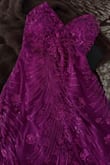 Was very excited about this dress, let me down. In the picture it looks pink, is actually purple. Bottom of the dress is too long and loose. Doesn't fit well on my body. - Gaby O.