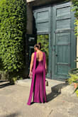 I wore this dress to a destination wedding in Portugal and I LOVED it. It fit me like a glove and I received so many compliments. The color is so vibrant and the cape is so sophisticated and adds that extra touch. Best purchase! - Ana-Michelle V.