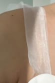 I received this dress a few days before my wedding, and it arrived with a tie strap torn, and the other one looks like it would be easily broken. I'm very disappointed since there's no way I will get a replacement on time! Generally, it looks pretty on me, but the tie straps are made cheaply. - Rachel B.
