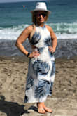 This dress is perfect for a beach getaway. I paired it with simple sandals and a white fedora while vacationing in Malaga Spain. It's light and airy fabric is perfect for any vacation. It also is a very flattering shape and shows curves without being too tight. Allows room for the extra glasses of champagne. ; ) - Emily C.