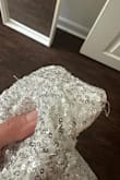 Absolutely love the dress, but it looks like someone had previously damaged it. Sequins are coming off, and there are loose threads straight out of the package. Was final sale, so nothing can be done. - JeanMarieJeanMarie S.