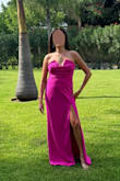 This dress was so comfortable and flattering, I received several compliments. It was very long, after wearing my 3 heels it did still glide a bit on the ground. The top part where it Vs was a little flimsy though and didn't sit properly, the material flopped forward/down. I wish it was more structured with boning. I had to get double sided body tape. Other than that, I was happy with my purchase. - Maria C.