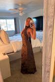 The material is such good quality, and the dress fits super well. I love the tie around the neck and the long strands in the back. I received many compliments in this dress! Highly recommend. - Anna L.