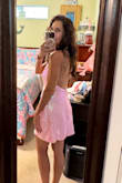 This dress fits perfectly! The style is very flattering, and the length isn't too short. It has just enough cleavage to look sexy, but not too much. The sequin details are beautiful. The color is eye catching and adorable! Perfect for my pink birthday cruise theme! - Monique F.