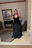 This dress was super comfortable and fit great. I carry most of my weight in my stomach, and this dress was not tight at all. I got SO MANY compliments on it! My only complaint would be the length. I am 5'5 and wore heels and STILL stepped on it. I had to pick it up every time I walked, and my husband sometimes stepped on it. I wish I got it early enough to get it hemmed. I will be hemming it before the next time I wear it, because I definitely will be wearing it again! I did not have to wear a bra because there is a built in one. - Katherine D.