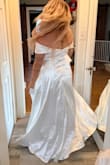 This dress is beautiful! I'm always worried white will be see through, but this material is very good quality and photographs perfectly! We are using it for my daughter's engagement photos and obviously need to steam it, but you get the idea! LOVE, LOVE, LOVE IT! - Emily E.