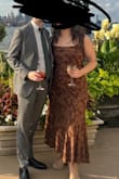 This dress is super comfortable. If you're between sizes, I'd highly suggest sizing down as it's stretchy. I think parts of the material could look a little cheap, but I love this dress and how comfortable yet flattering it was. - Michelle F.