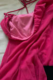 The color in the photo looks much lighter. It's fully hot pink. I still like the dress, but it didn't come as intended. (Color was supposed to be like the inside on photo 2) - Ava S.