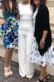 First, I did get a lot of compliments on this outfit. I wore it for my courthouse wedding and people are not accustomed to seeing white jumpsuits at bars. You'll get a lot of looks.
However, a couple notes: 1. Perhaps it's because of the white, but I found myself more conscious of my tummy when wearing this. I'm a size 4-6 but I felt like the fabric or cut was a bit less forgiving than other Lulu jumpsuits. 2. I had to have my mom lengthen the legs as much as she could. At 5'8 I would have needed to wear flats to make it look ok as-is, which I think stunts how sexy a wide leg jumpsuit can be. 3. In case you're worried, the white is not see through but you really can't wear undergarments with it. The lace texture of my VS lacies was visible so I went completely nude underneath. You won't see hair or nipples, but you do see any tags or stitching from the first layer through the second - and in my case of even the most "no show" of underwear. - Julie H.