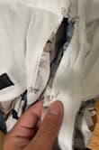 The buttons are not properly sewn. The button by the neck just fell off out of nowhere due to lack of securing the thread. Also, there were thread sticking out of the dress. I wish I knew this before buying it. Now I can't get a refund. - Janne N.