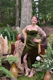 I fell in LOVE with it online. I ordered a large, but they shipped me an XL, and they immediately sent me a replacement with overnight shipping. The right one came, and it was magical! I felt like a million bucks, and I got the best compliments all night from the women and all the stares from the men! I did wear Spanx because I'm self-conscious about my sudden weight gain and bloating. But it is a ribbed type corset inside. I'm not sure I even felt this good in my own wedding dress, if I'm being honest!! Just buy it. Trust me..... - Roxanne P.