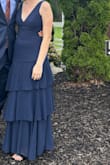 I bought this dress for a wedding and it is beautiful, but it broke on just the one wear. It is also very very long, and I'm not a short person (5'8). Without being hemmed, it is impossible to wear without heals. It also fit a little weird in the armpits, and it broke along the seam on the side. Otherwise decent quality, but very prone to wrinkles. I'm very disappointed for the price! - Katherine L.