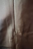 Came with loose strings and loose stitching in the back, super wrinkly. Really upset with the quality. - Amy H.