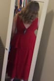 The dress fit an XL in my opinion perfectly!! - Carly T.