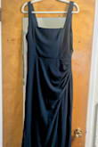 Beautiful dress, but definitely size up! I absolutely loved the look of this dress. The navy color is gorgeous, and the ruching gives it such an elegant, flattering look. The material also feels nice and makes the dress look more expensive than it is. My only issue was the sizing. I ordered a Large, which is usually what I wear, but there really isn't much stretch to the fabric, and it was too fitted on me. I ended up needing an XL. If you're between sizes or prefer a little more room, I would definitely recommend sizing up. Other than that, it's a beautiful dress and would be perfect for a wedding, reception, or formal event. - Kassandra N.