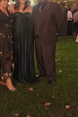 I very much enjoyed wearing this dress. The material is heavy and looks expensive. I love the deep emerald color. Definitely worth the price. I got a lot of compliments throughout the night. Only thing I would change is the length. I had to pay to get it hemmed 5 inches to wear with heels. - Nelly V.