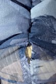 Hi, I'm not sure if this is the best way to go about this, but I received my dress and it was coming apart at the slit when I removed it from the packaging. I was wondering if I could get a replacement dress in the same color and size. Thank you. - Chelsea S.