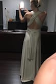 Ordered this dress to see if I would like it for my bridesmaids. Very pleasantly surprised by the quality and color. Fabric is brilliant/bright and very stretchy. It wasn't quite right for what I was looking for for my wedding. It will hug your curves. Length is great and I liked how you can tie it a bunch of different ways. - Susie L.