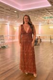 I agree with previous reviews that the straps are too loose.. otherwise this dress is perfect! Great quality & a unique color/fabric that received many compliments throughout the night. - Lisa R.