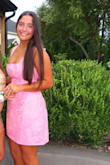 The dress was more pink in person than in the photo, but was SO CUTE. Very comfy and easy to dance in. Material was soft, and I had 0 problems! - Kate L.