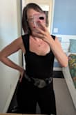 I don't usually leave reviews, but I just had to because it's SO HARD for tall, pear shaped ladies to find jumpsuits that fit. This has a good amount of stretch and hugs you in all the right places. I don't usually feel super confident with my body in clothes, but for whatever reason this one had me feeling AMAZING. If you're like me (5'10, 155 pounds, relatively flat chested with a big butt, wide hips, and a tummy), this is the jumpsuit for you! You'll be feeling so confident, trust me! 

Since it's relatively plain, it's also really easy to dress up or down or wear to different events.  

The only negative is that it's hard to zip and unzip on your own. So just make sure your +1 is available all night to unzip slightly whenever you need to go to the bathroom. = - Stephanie F.