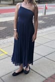 Amazing dress, perfect for hoco did put skin-to-dress tape on the no-strap side I don't think I would have been comfortable without it. The no-strap side hit a little too low for my comfort. - Avery T.