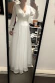I'm currently 24 weeks pregnant and got this dress for my elopement. It was perfect. I love that the dress is like a wrap, and you can adjust it to your waist. For my baby bump, it was a great choice. - Maria G.