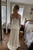 This dress is very classy and timeless. I thought I wanted something more whimsical, with lace and draping, but my mom and I both agreed when I tried this on that it was a winner. Did not feel cheap at all, for the price. - Lexi P.