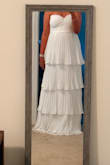 The dress was super nice. But the hook was missing. The pictures came out really nice! - Harmeet D.