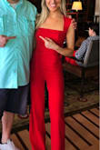 I LOVE this jumpsuit! I was receiving compliments all night. Fit like a glove. I'm 5'4 and it fit with about 4 inch heel. I might hem it in the future. - Brittany I.