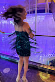I wore this dress to my cousin's Vegas wedding and received so many compliments! It's a fun dress that I could definitely wear again! I got a medium, which fit fine, but I probably could have sized down. Overall, I love the dress! - Paulette S.
