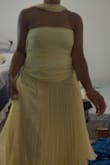 I don't like this dress. I wouldn't get it; the fit is weird in the front there is like extra fabric that just hangs. I'll probably have to get it altered later. Love the color. - Jocelyn S.