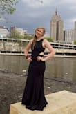As soon as I saw this dress online I was in love with it! I wore it for my senior prom and felt so beautiful! The fabric is super comfortable and allows you to move and breath with ease. It's a simple design which allows you to wear it for pretty much anything. I definitely recommend this dress to anyone looking for a more classic/mature aesthetic, you will be blown away by it's radiance. - Audrey K.