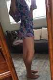 I really like this romper. It is thin and short so I would rec'd more for summertime casual wear versus anything dressy. I am 5'6, it's just below my cheeks, I am concerned about washing it. Bright vibrant colors. Loose and fun but still flattering - Summer B.