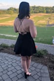 I was so incredibly skeptical to order a dress online and bank on wearing it to a wedding this upcoming weekend, even after reading the wonderful reviews... but I am absolutely OBSESSED. Seriously, the fit around the waist is incredibly flattering and the nice part is I don't even need to worry about wearing a bra with it. In my opinion, it fits very true to size!

Definitely recommend as a cute, simple black dress. Also just ordered it in red, which should be arriving soon, so I cannot wait to try that one out as well! I'll try and post some photos to this eventually so you can see how it looks. - Fallon P.