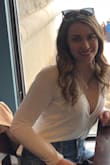 It's a cute bodysuit that is generally true to size. The front is supposed to be low, but it is VERY loose. Without double-sided tape, I wouldn't be able to wear this because it will blouse completely open. But with fashion tape, it's perfect. - Anna L.