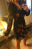 Although it looks a little different in person I still love it! I was nervous about ordering a small because of my hips but I have plenty of room!!! Super cute for a wedding I have coming up. Also a perfect length for short legs too! Although the sleeves are a little long I'll roll them up like in the picture! - Ariel L.
