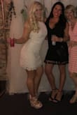 No stretch at all, wore a strapless bra and spanx would buy again. I think it looked nice on me - Lexie R.