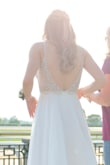 I wore this dress to prom and it was perfect!! It was a little big on the top so I got bra inserts so it would fit better. It was very long but with heals it was fine. Overall I really liked this dress and would recommend to everyone - Maddie D.