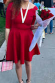 I love this dress. The material is much more high quality than I expected on the material. It's thick but stretches well. The red is also very pretty; it's a good mix without being overly vibrant.  I wore it to my pinning ceremony and got so many compliments on it! I snatched it while on sale too and couldn't be happier! - Jessie W.