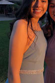 I wore this dress for my aunt's wedding and it was the exact color of the wedding!! The material was really nice and breathable. The top part was a little loose on me (2nd Picture), but nothing too bad. It was also a pretty long dress even on me and I'm 5'10". Overall a great dress! - Kaylien M.