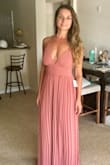 This is the 3rd dress I have ordered from Lulus for a wedding (I wish the bridal parties I'm in would order from here - I know I am). Each time I've purchased a Large BC I'm quite tall and each time I've never had to do any alternations. This dress in particular is so comfortable and flattering. I normally wouldn't buy such a low cut dress but this time I did and I'm not regretting it. I'll be wearing this to a Spring wedding on MDW! It really is so comfortable and the color is much better in person. I like that it's not form fitting and I'm able to move in it sooo freely. - Olga B.