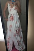 This dress is really beautiful and elegant, I ordered a x small size and it fits perfect because you can adjust it, it's really large on me so I had to altered it. - Lina C.