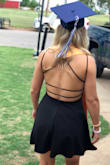 I am more athletic and have wider shoulders but a medium still worked fine! It was somewhat difficult to get over my wide shoulders but I made it work. I loved this dress and wore it for my graduation. The material is very nice and not sheer at all. It fit perfectly. I did sew up the front a little bit but that was just because I'm not very big chested. Definitely would recommend this dress! - Gray
