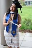 I'm usually a medium but I ordered both a large and a medium. The medium fit a little snug so I kept the large. I wore this for my graduation and got so many compliments. - Norena V.