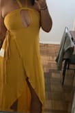 If you have a bigger cup size beware that this dress is slightly revealing. I'm 5'7, ordered a medium because it's a wrap around and the dress falls perfectly. It's super flattering on your waist and back side. The only issue was you can't adjust the key hole on the chest. When I tied the halter around my neck like normal, the opening was so large my chest was almost exposed and the fabric was jetting out. It doesn't open like on the model, it spreads apart. So I took the halter ties and literally had to wrap them around the middle portion to tighten it. Now it looks like twists. Still wearing it to a wedding though, everyone says it's okay. OH! And it does wrinkle super easily like everyone says, but that's rayon for you. - Jessica S.