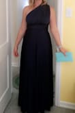 This dress lays nicely, and you can wrap it so many ways, I got a ton of compliments.  It is a little long but worked perfectly for me with 2 in heels. - Beth F.